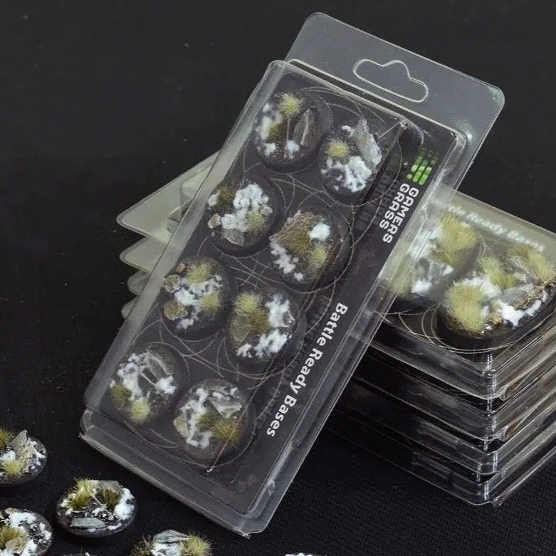 Gamers Grass Winter 32mm round Battle Ready Bases in stacked blister packs of eight