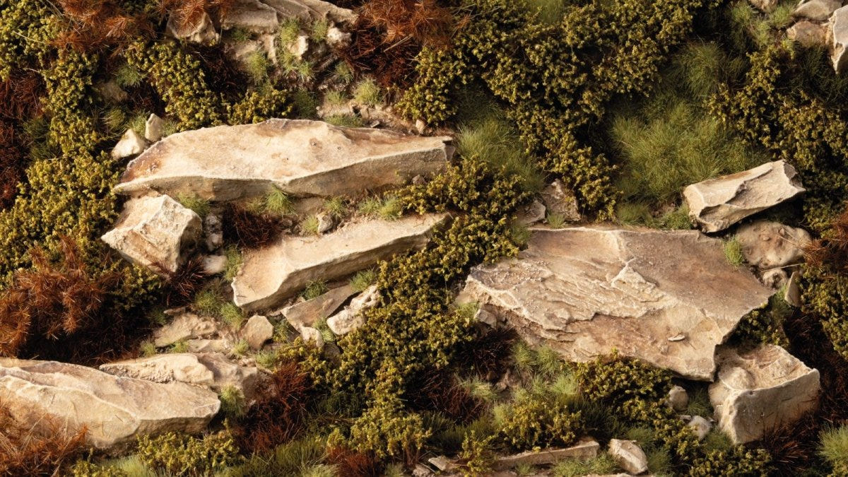 Gamers Grass Dry Green Shrubs tufts around rocky outcrops on a scenic board
