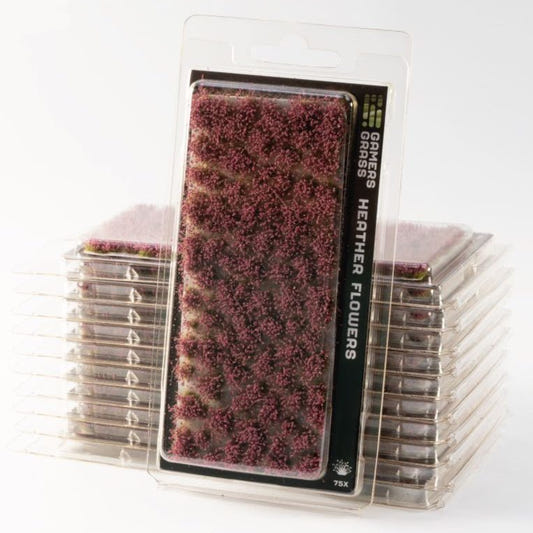 Gamers Grass Heather Flowers tufts in blister packaging, shown with stacked packs