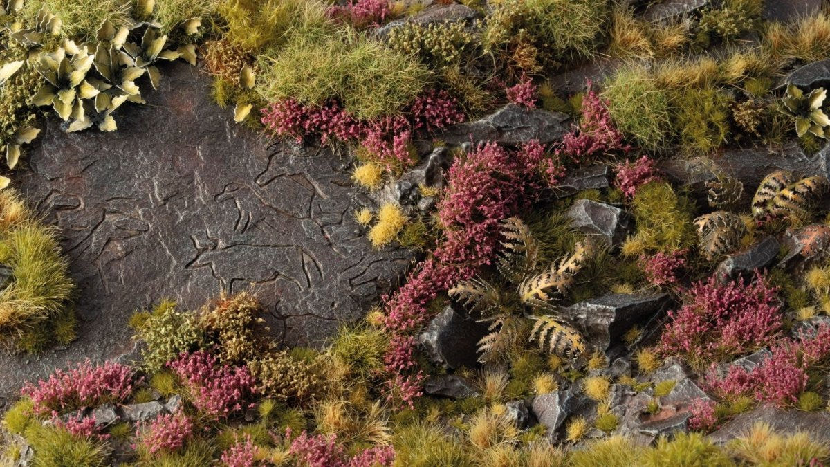 Gamers Grass Heather Flowers tufts among shrubs and ferns beside a muddy track on a terrain board