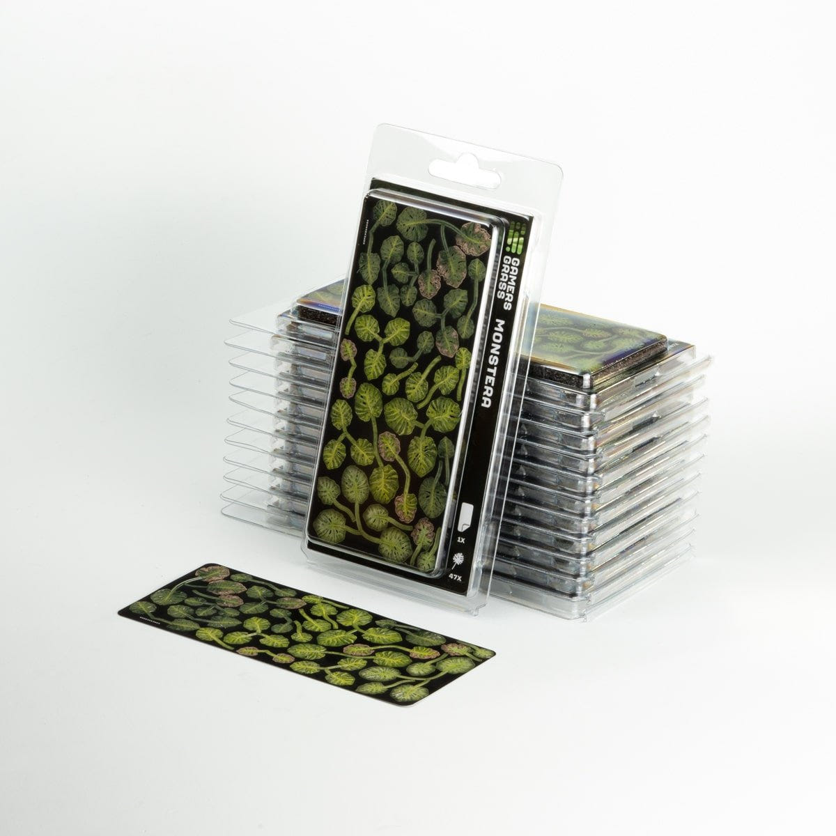 Gamers Grass Laser Plants Monstera blister stack with a flat sheet of laser-cut leaves