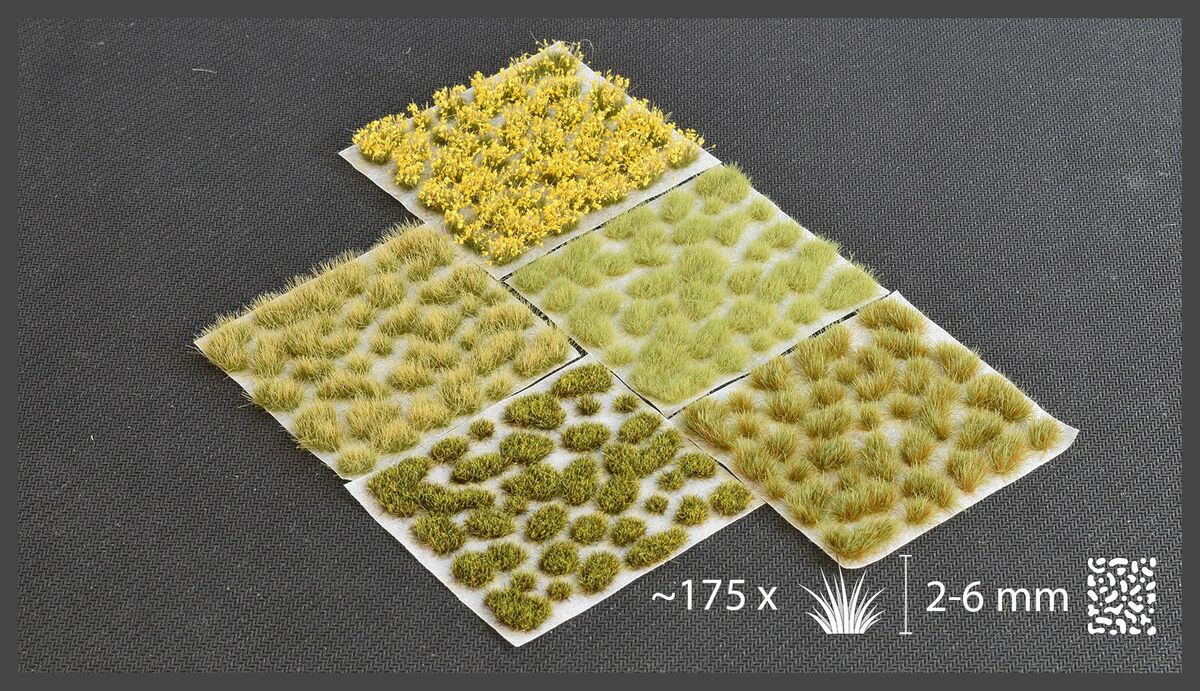 Gamers Grass Highland Tuft Set sheets laid out, around 175 tufts from 2 to 6mm