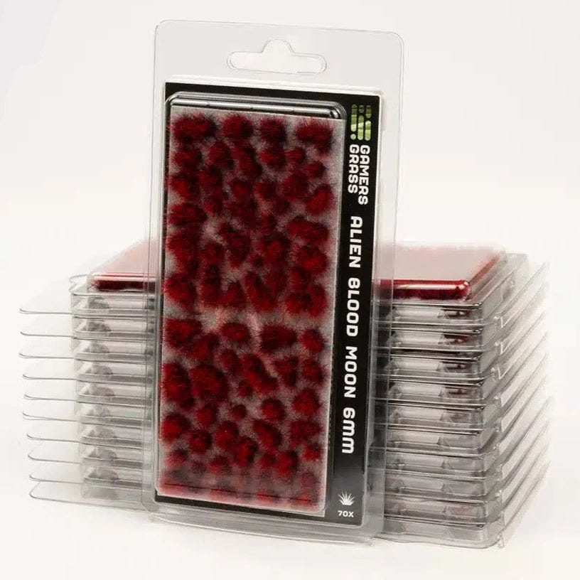 Gamers Grass Alien Blood Moon 6mm tufts in blister packaging, shown with stacked packs