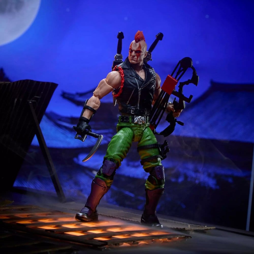 Ninja Force Zartan figure with bow and sickle on a moonlit rooftop scene