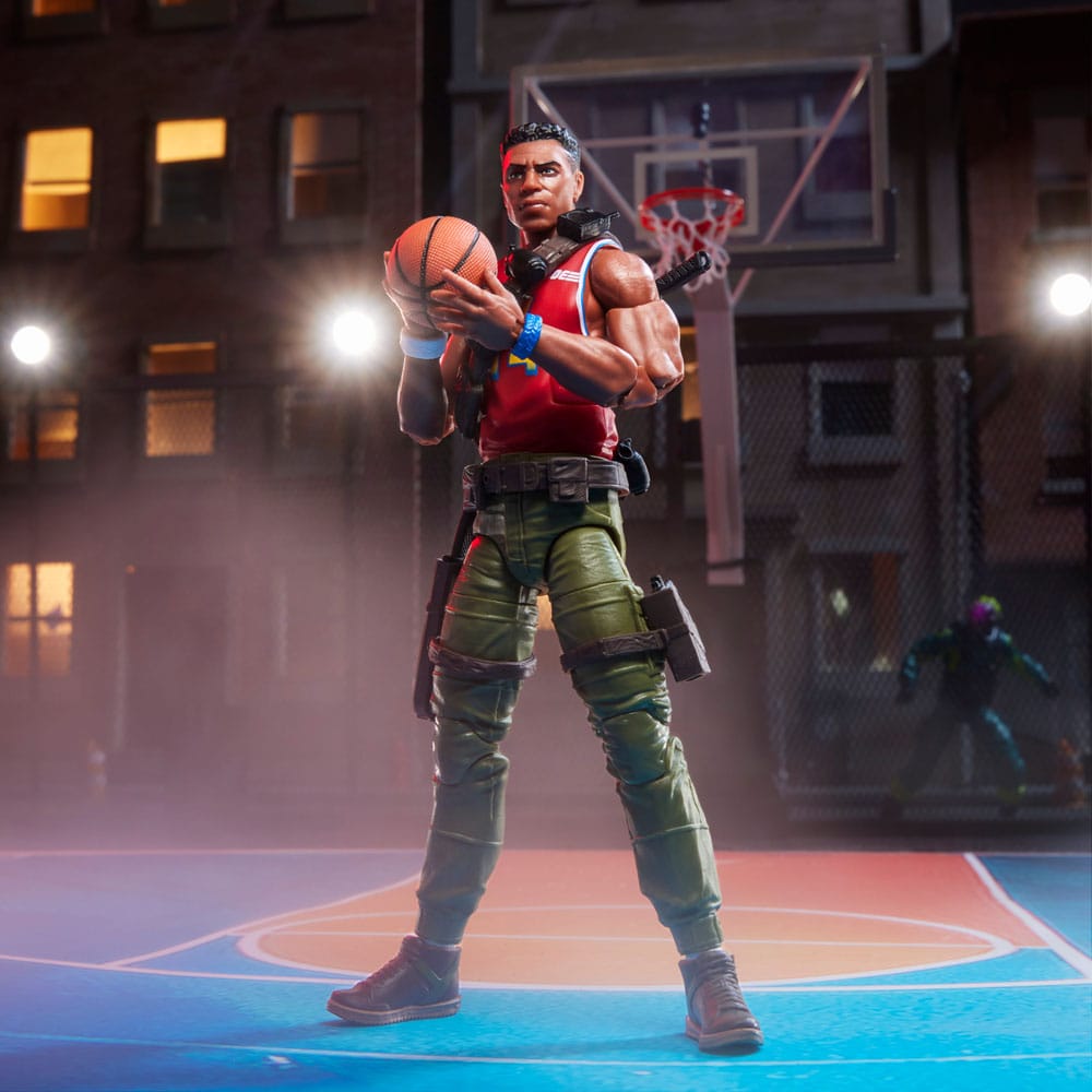 Big Lob Sanders figure holding a basketball on a night-time court under floodlights