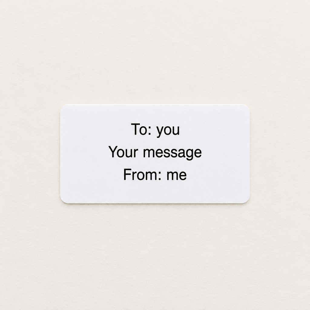 Gift message printed on a plain white label, reading To, your message and From