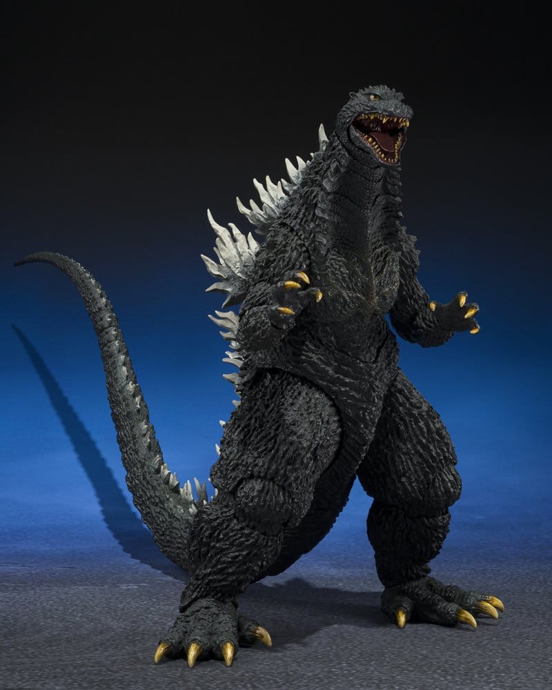 S.H.MonsterArts Godzilla 2003 figure three-quarter view with white dorsal spines against blue backdrop