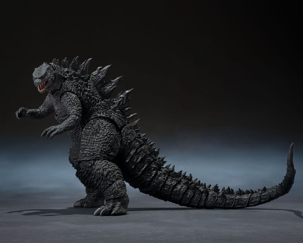 Side profile of the Godzilla 2014 S.H.MonsterArts figure showing dorsal spines and tail