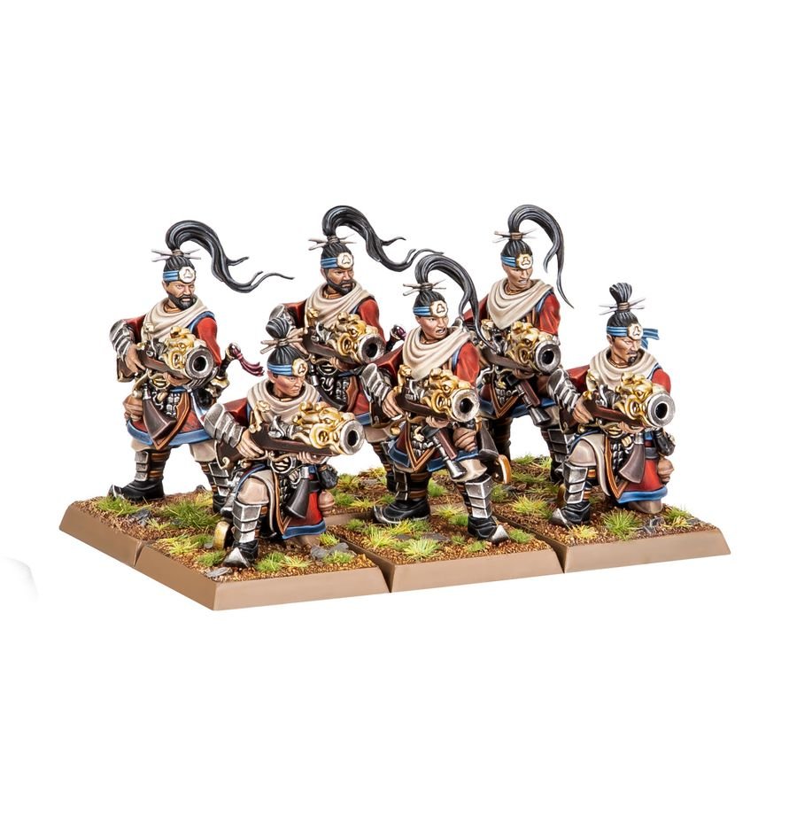 A set of six painted fantasy warrior miniatures posed on a rectangular base with grassy texture, photographed against a plain white background.