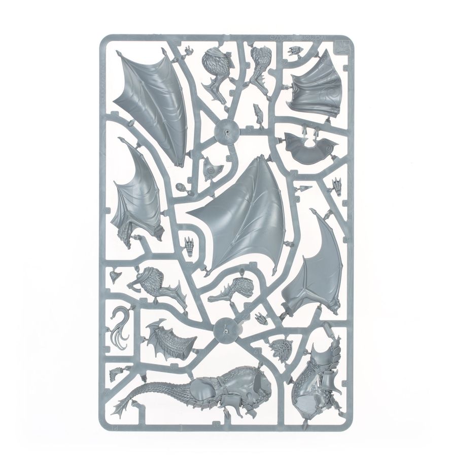 A rectangular gray plastic sprue containing multiple unpainted miniature model parts, shown against a plain white background.