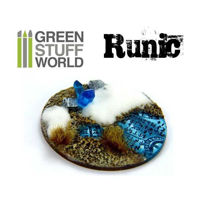 Wintry miniature base textured with the Green Stuff World Runic rolling pin, painted blue with snow and tufts
