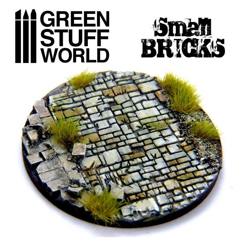 Painted round miniature base with grey brick paving made using the Small Bricks rolling pin