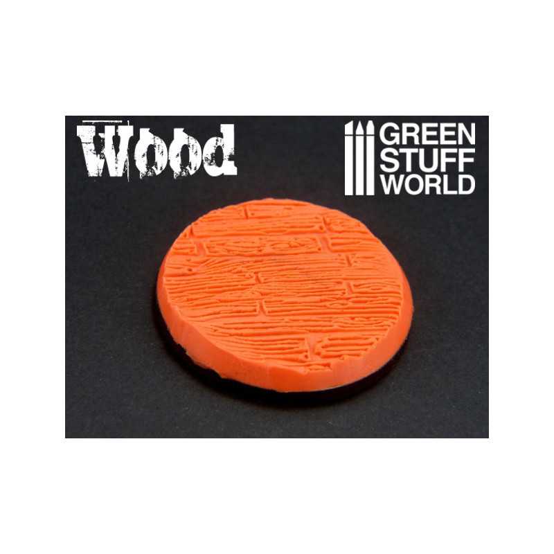 Orange putty round base pressed with the Green Stuff World Wood Planks rolling pin texture