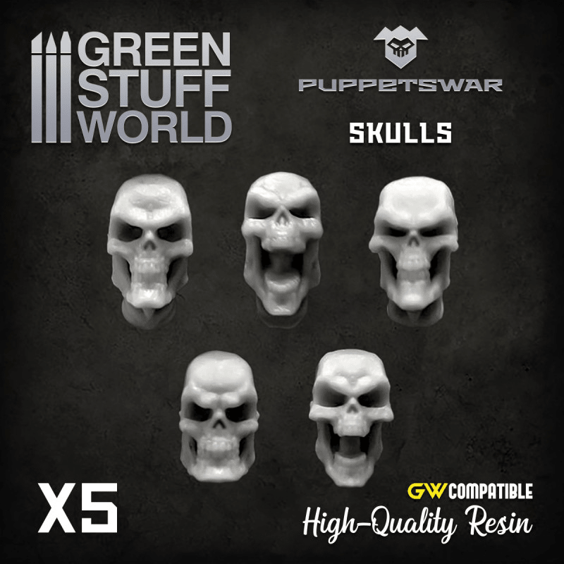 Green Stuff World resin skulls, five 28mm-scale skull bits on a dark background