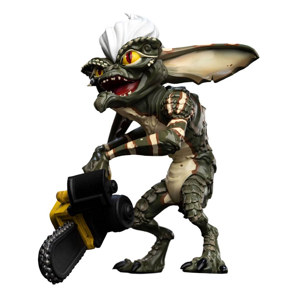 Stripe Mini Epics figure by Weta Workshop, left three-quarter view grinning with his chainsaw