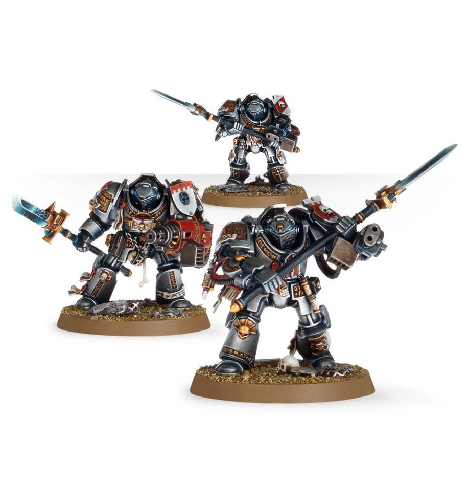 Three painted Grey Knights Terminators with nemesis falchions and a psycannon
