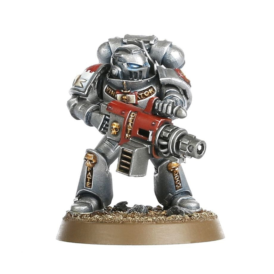 Painted Grey Knight in silver armour carrying a heavy red-cased weapon