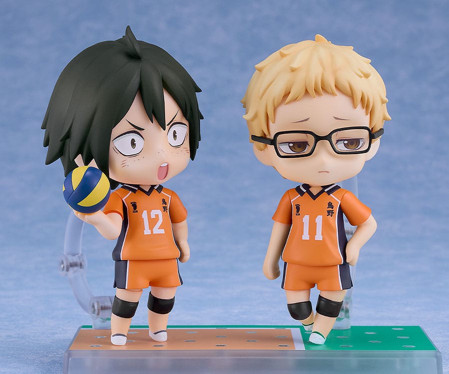 Kei Tsukishima Nendoroid beside a Karasuno number 12 teammate Nendoroid holding a volleyball