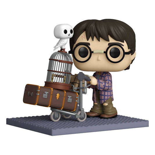 Funko Pop! Deluxe Harry Potter pushing a luggage trolley with trunk and Hedwig's cage