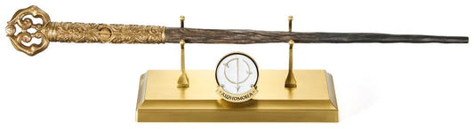 Noble Collection Harry Potter Alohomora wand replica with ornate handle on a gold display stand