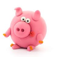 Finished Hey Clay Piggy model, a round pink clay pig with big eyes