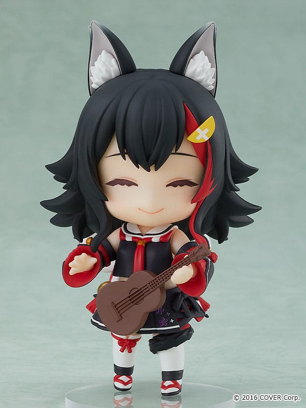 Ookami Mio Nendoroid smiling with eyes closed, playing a ukulele