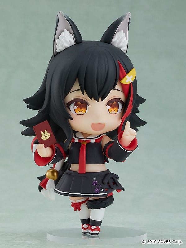 Ookami Mio Nendoroid holding a tarot card and pointing upwards