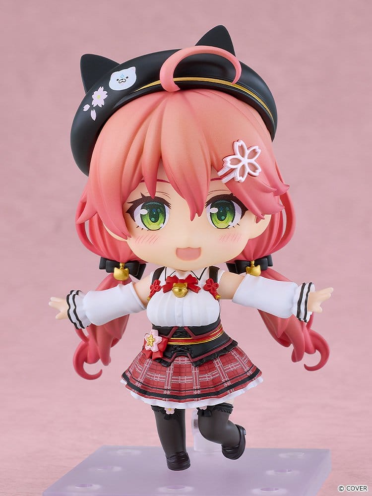 Good Smile Company Nendoroid Sakura Miko in casual outfit on clear stand, smiling with arms spread