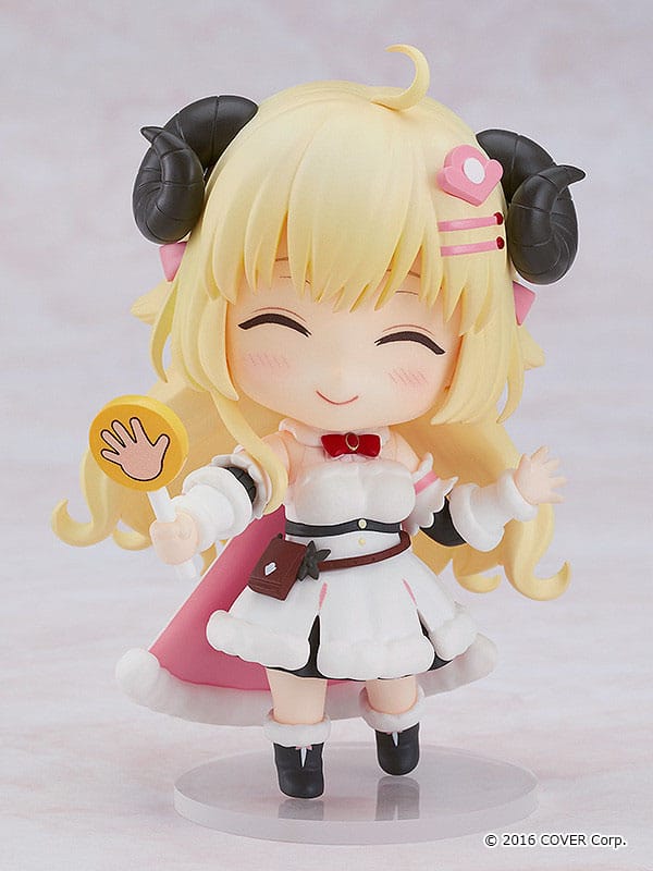 Tsunomaki Watame Nendoroid smiling with eyes closed, holding a paper hand sign