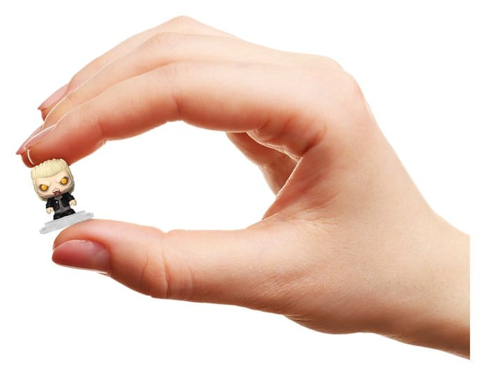 Hand holding a tiny David Bitty Pop! figure from The Lost Boys to show its miniature scale