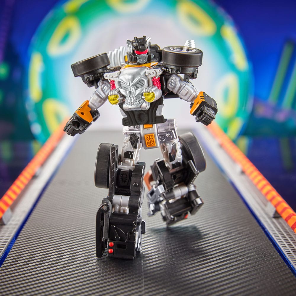 Bone Shaker robot mode mid-stride on a Hot Wheels style track, Hasbro Transformers figure