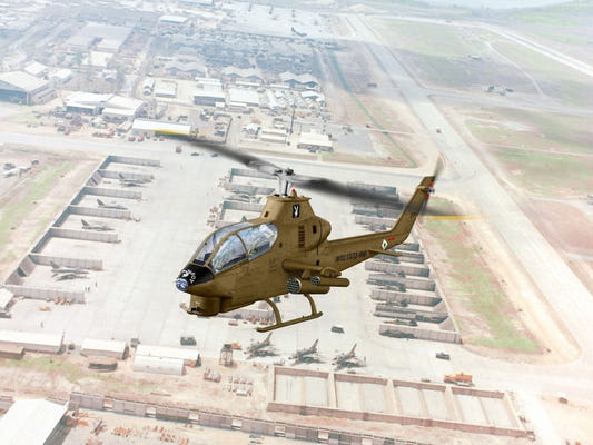 ICM 1/35 AH-1G Cobra Early Production helicopter box art showing the gunship over an airbase