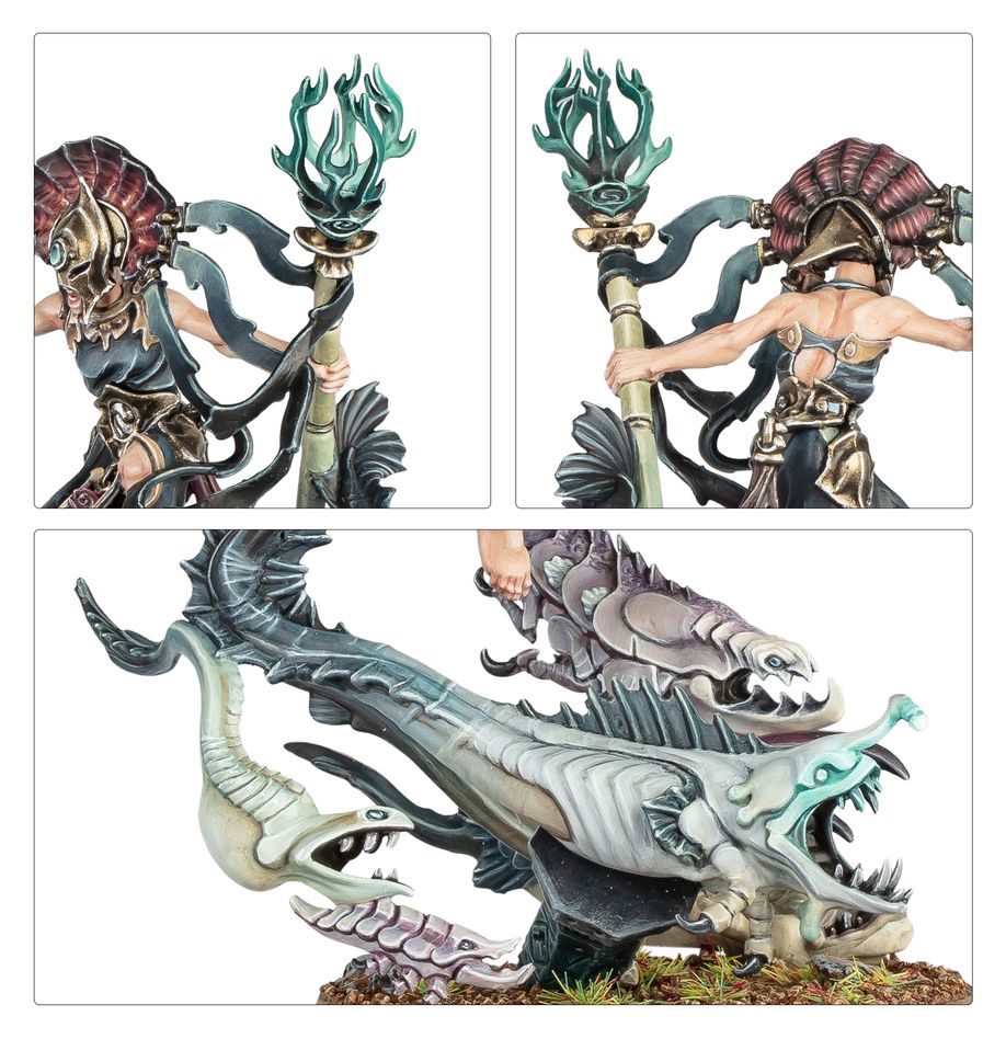 Close-ups of painted Mathaela's headdress, staff and the pale abyssal fish at her feet