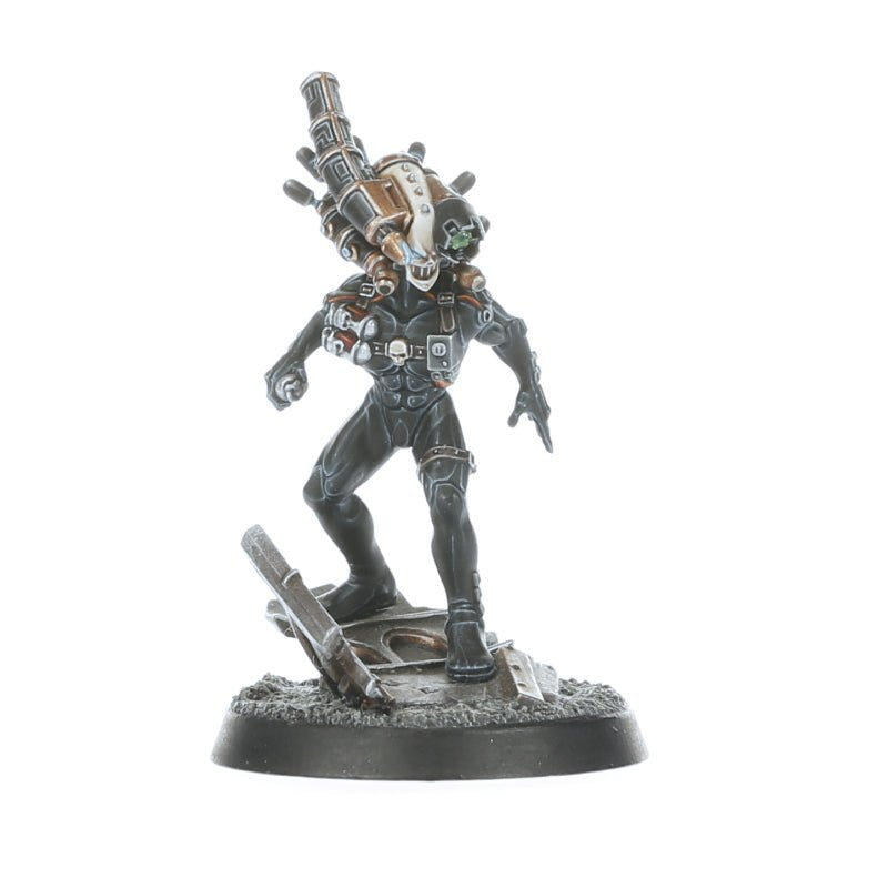 Painted Culexus Assassin striding over wreckage, three-quarter view, Imperial Agents