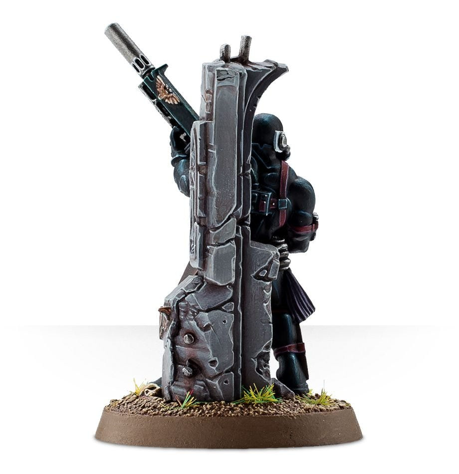 Painted Vindicare Assassin, rear view showing the carved ruin pillar he hides behind