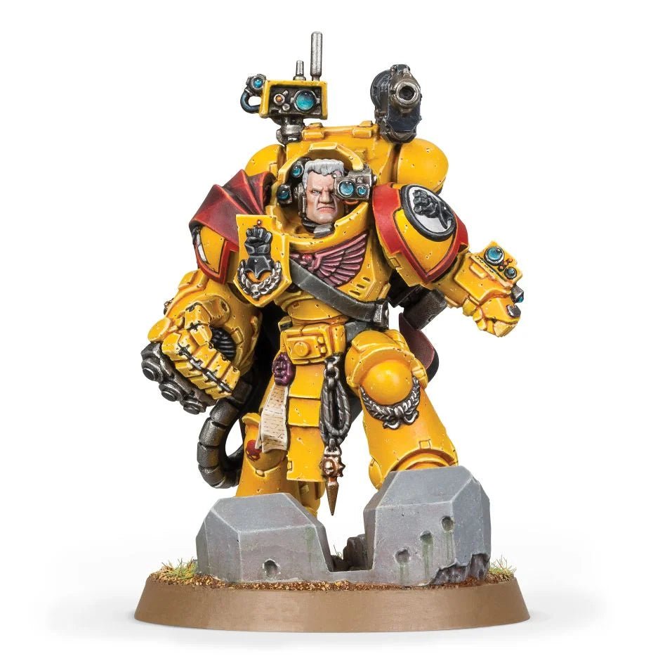 Painted Captain Tor Garadon in yellow armour with Hand of Defiance and grav-gun backpack