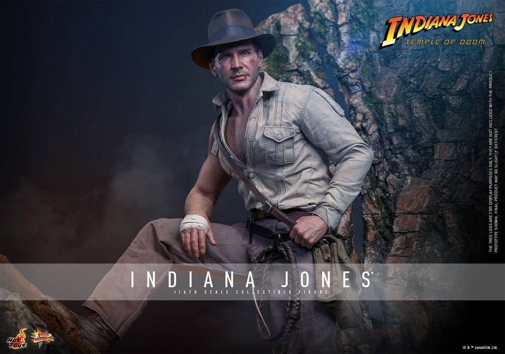 Hot Toys Indiana Jones 1/6 figure promo banner, seated against rock wall in fedora