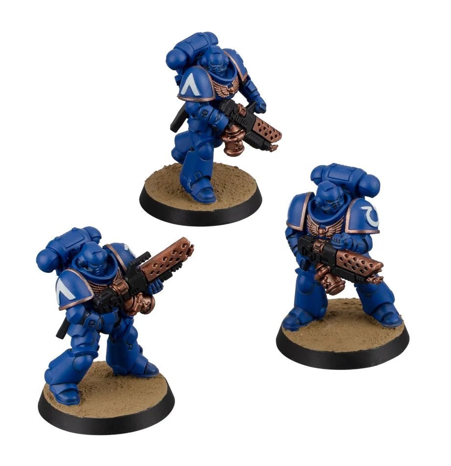 Three painted Ultramarines Infernus Marines with pyreblasters on bases