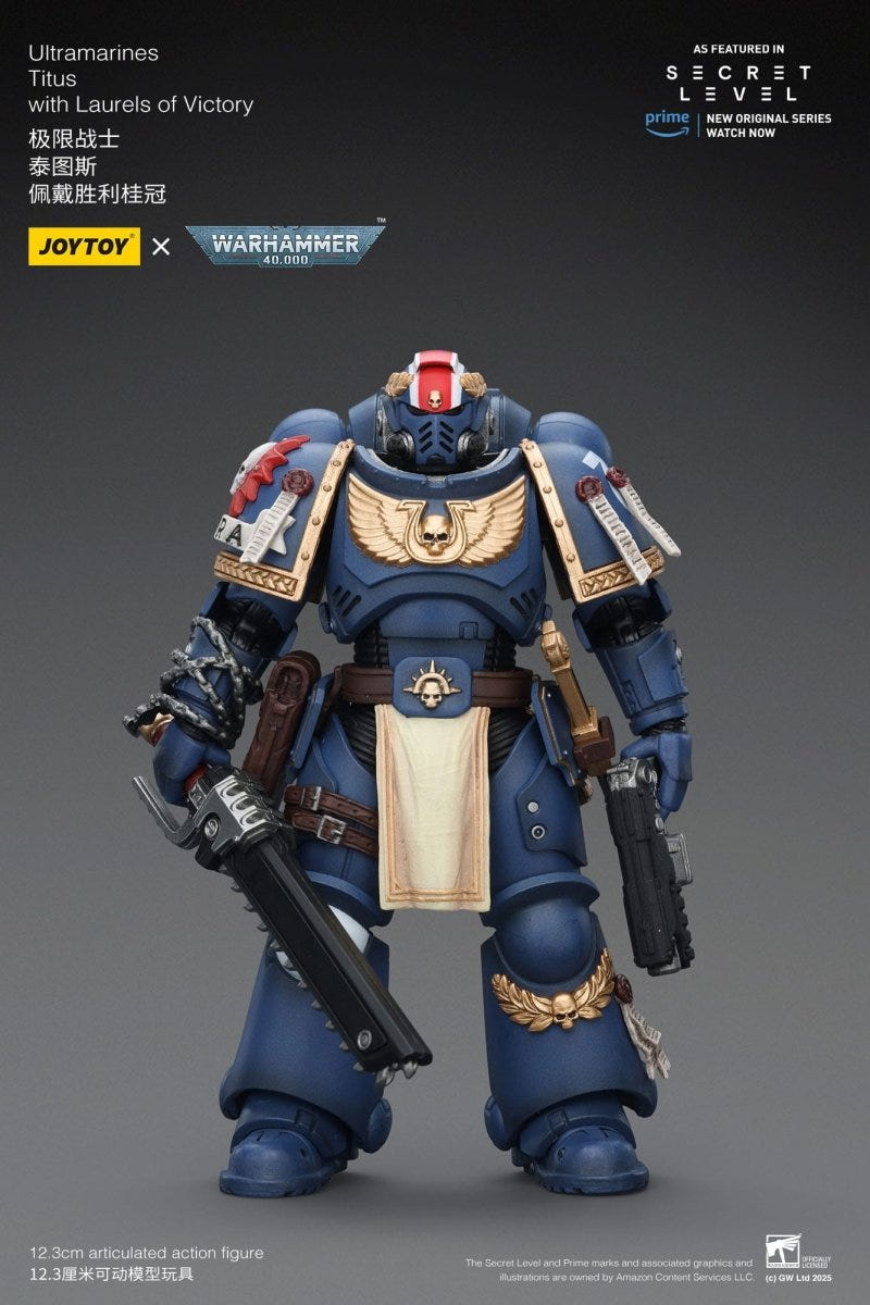 Joy Toy Ultramarines Titus figure standing with chainsword and bolt pistol at his sides