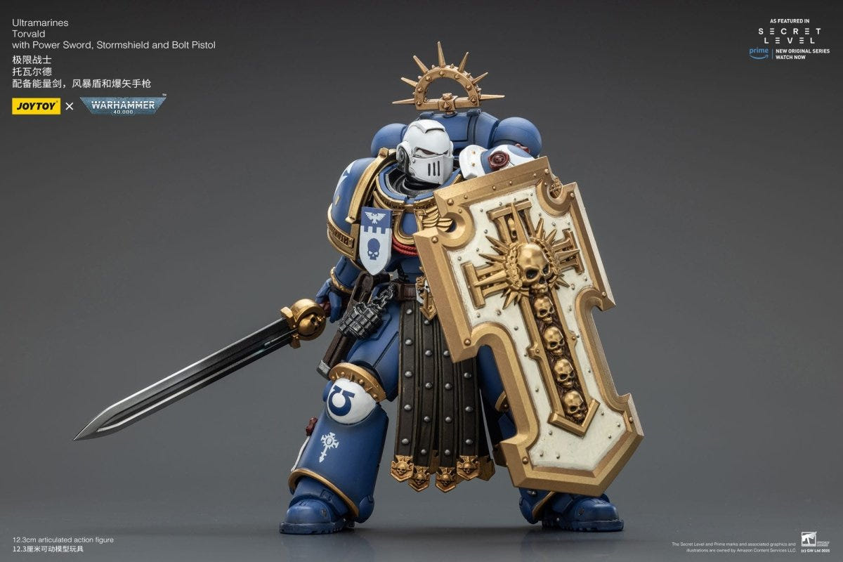 Joy Toy Warhammer 40k Ultramarines Torvald advancing behind stormshield with power sword extended