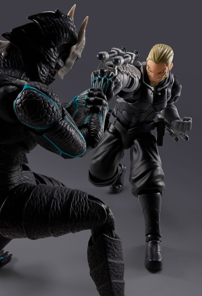 Isao Shinomiya S.H.Figuarts figure facing a horned black kaiju figure in a battle scene