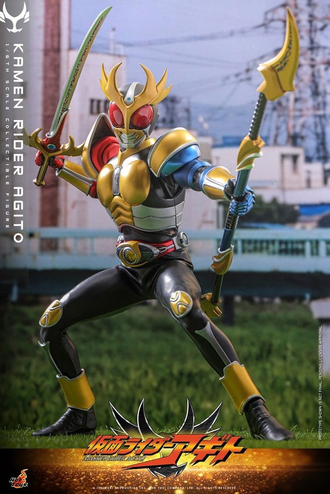 Hot Toys Kamen Rider Agito figure in Trinity Form wielding Flame Saber and Storm Halberd outdoors
