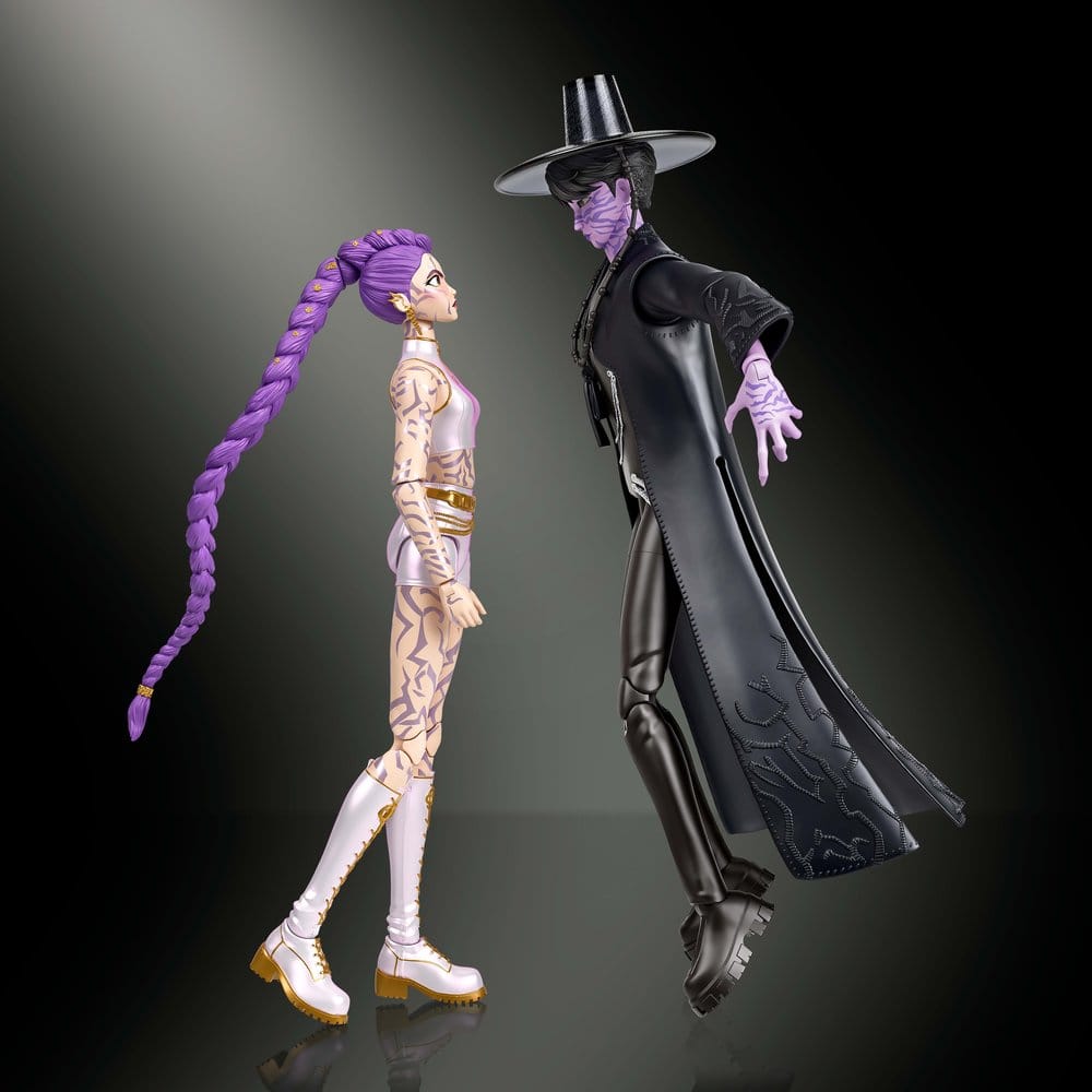 Mattel KPop Demon Hunters Rumi and Jinu figures facing each other on a dark backdrop