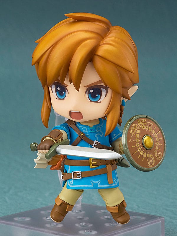Nendoroid Breath of the Wild Link in a determined pose with sword and shield raised