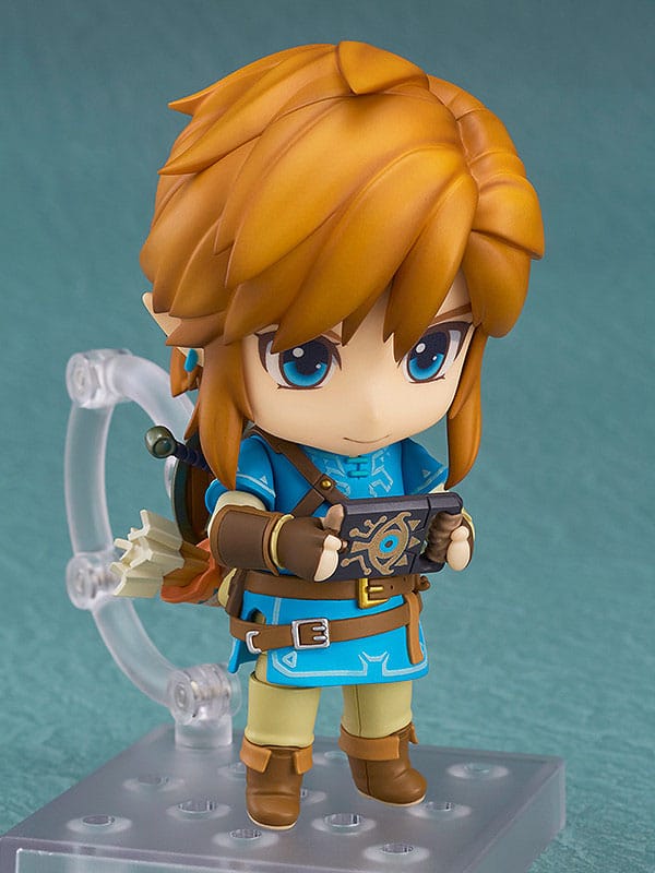 Nendoroid Link from Breath of the Wild holding the Sheikah Slate in both hands