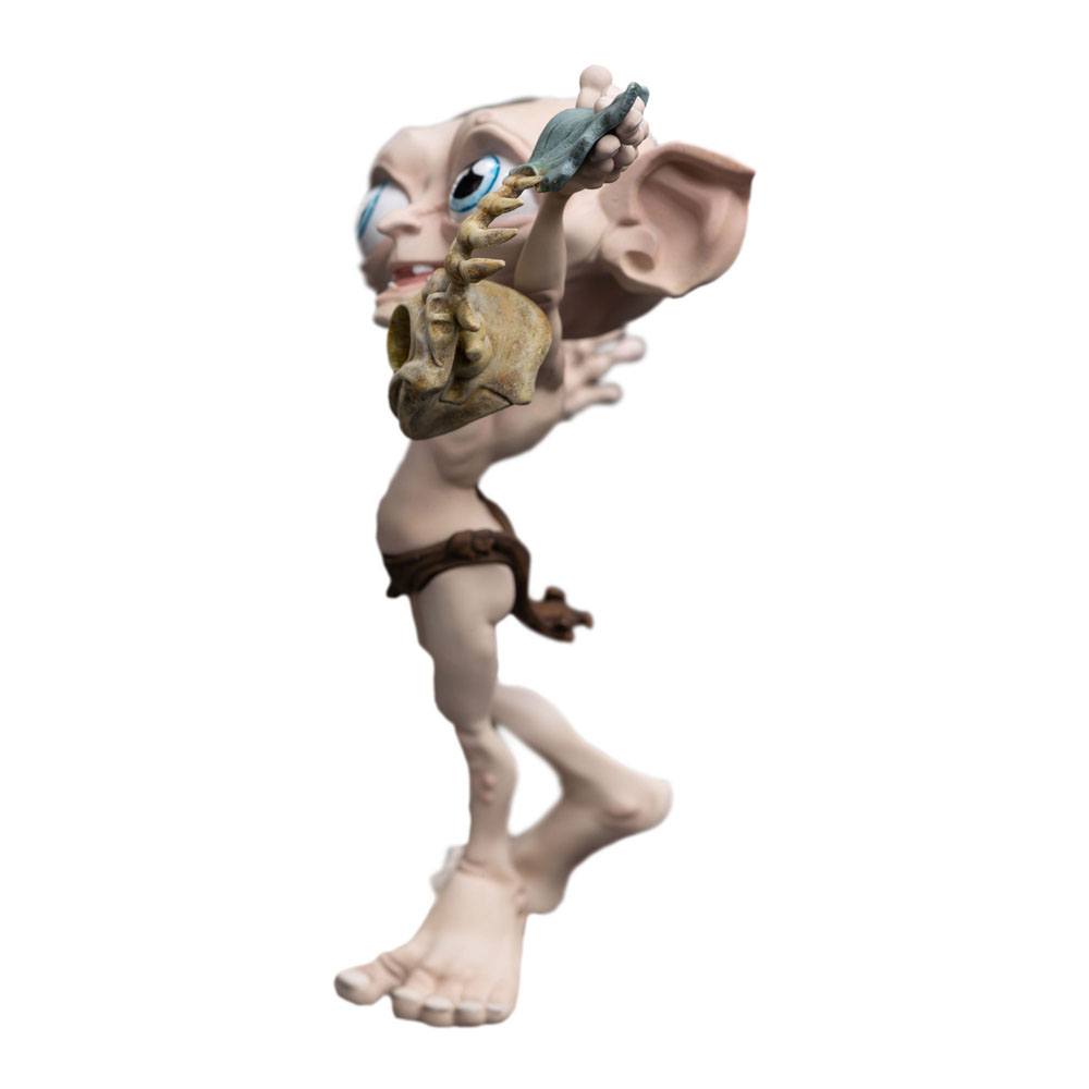 Sméagol Mini Epics figure by Weta Workshop, side view holding his fish aloft