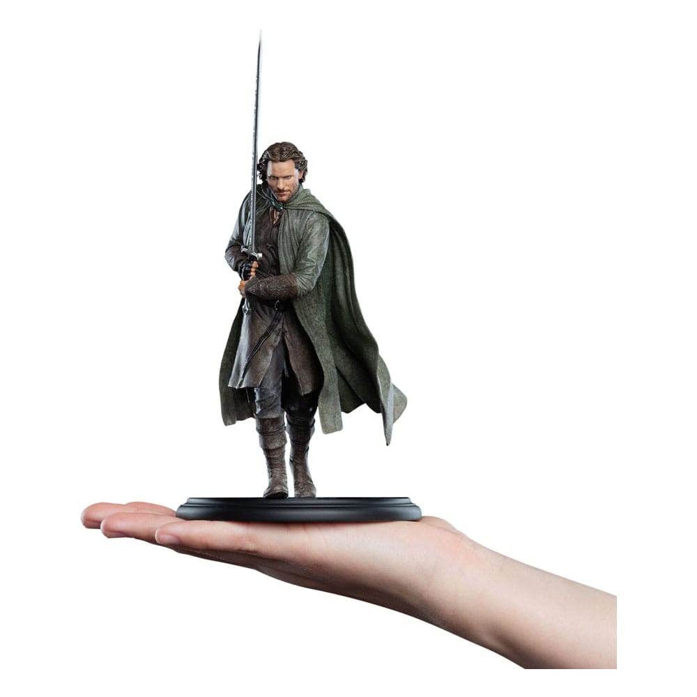 Weta Workshop Aragorn 20cm mini statue held on an open hand to show its size