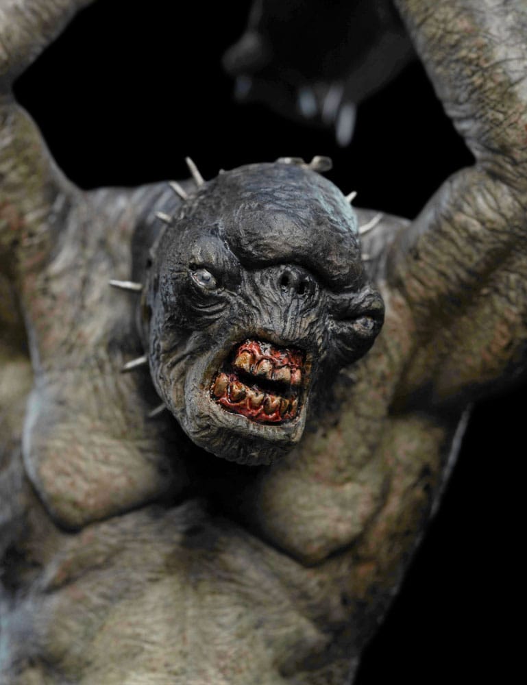 Close-up of the Weta Cave Troll's snarling face and bloodied teeth