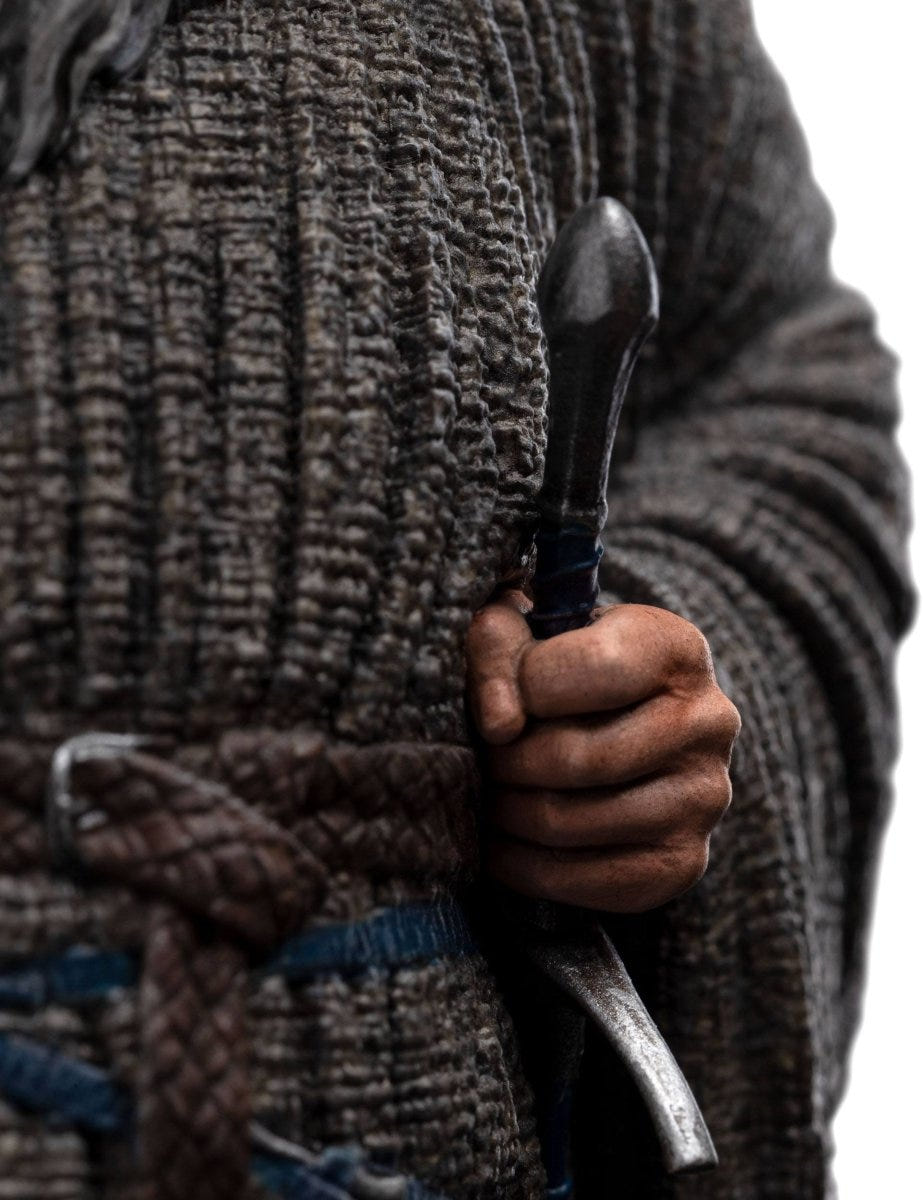 Close-up of Gandalf's hand gripping the sword hilt, Lord of the Rings mini statue