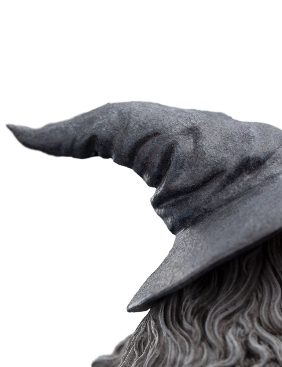 Close-up of the wide-brimmed grey pointed hat on the Gandalf mini statue